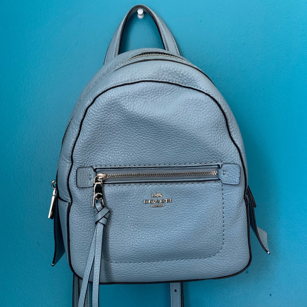 Coach mini backpack/crossbody in light blue.
